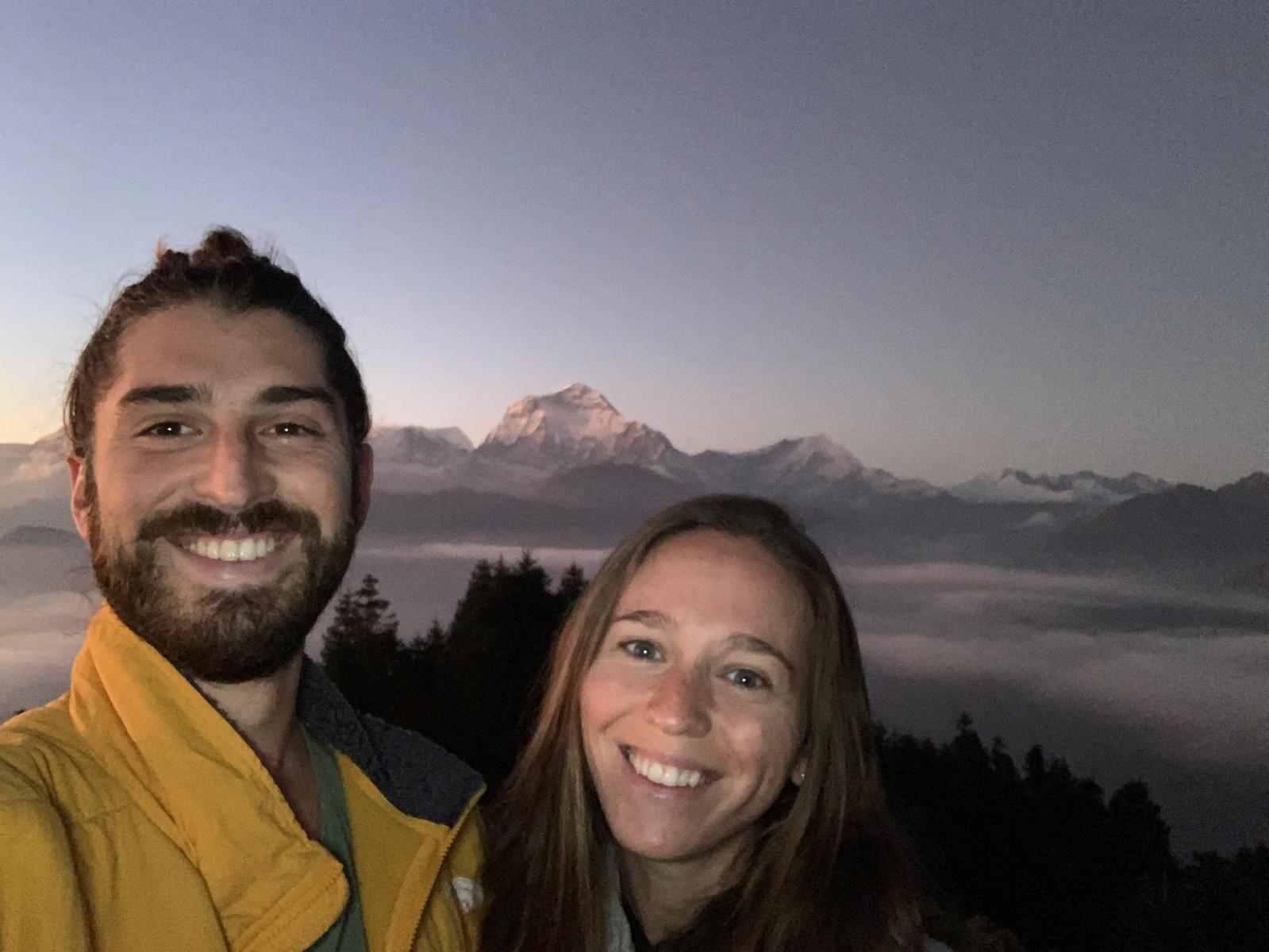 The co-founders of Eat Your Lawn smiling together at sunrise